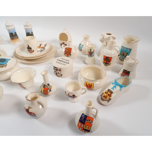 46 - A collection of Goss and other crested china including figure, cat etc.