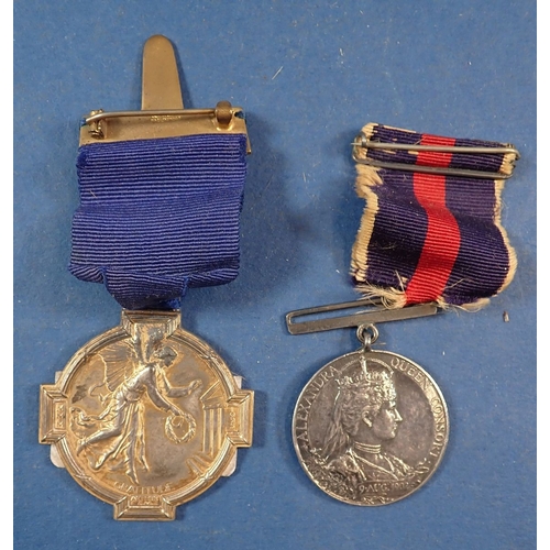 540 - A silver masonic medal and an Edward VII commemorative medal