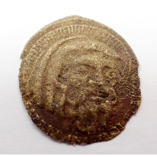 549A - A Byzantine religious coin / token featuring a bearded man to obverse and crucifix and text to rever... 