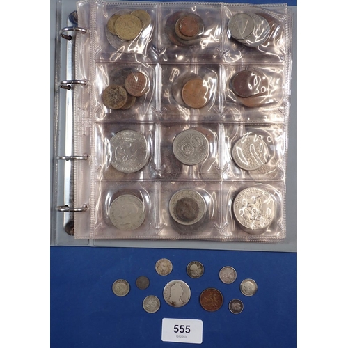 555 - A collectors coin album containing British and World coins including George III penny 1806, 1797 car... 