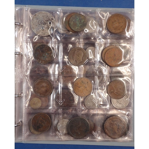 555 - A collectors coin album containing British and World coins including George III penny 1806, 1797 car... 