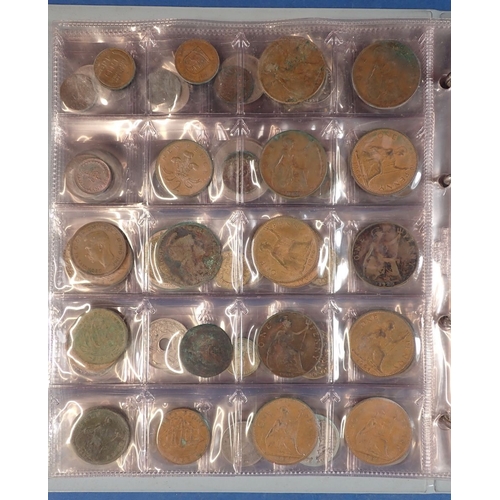 555 - A collectors coin album containing British and World coins including George III penny 1806, 1797 car... 