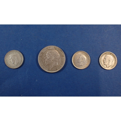 556 - A group of British coins to include Victoria-Elizabeth II, pennies, half pennies, sixpences, shillin... 