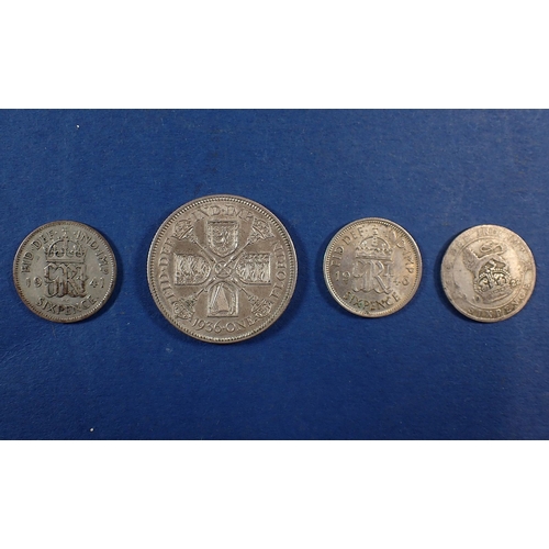 556 - A group of British coins to include Victoria-Elizabeth II, pennies, half pennies, sixpences, shillin... 