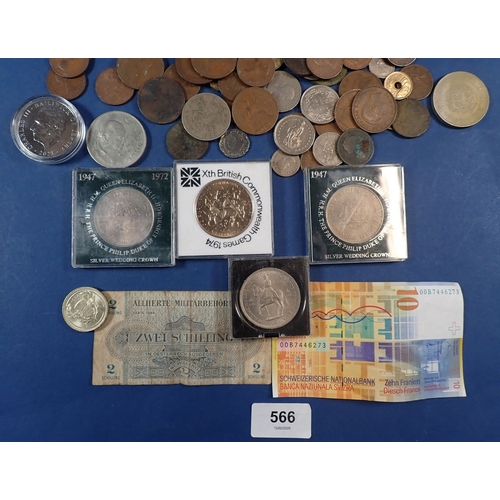 566 - A collection of mostly British coins including George III farthing, commemorative crowns etc plus a ... 
