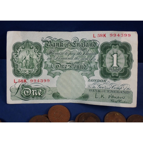 566 - A collection of mostly British coins including George III farthing, commemorative crowns etc plus a ... 