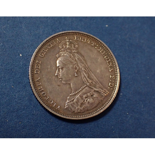 570 - A group of British and World coins and medals including silver content examples Victoria shilling 18... 