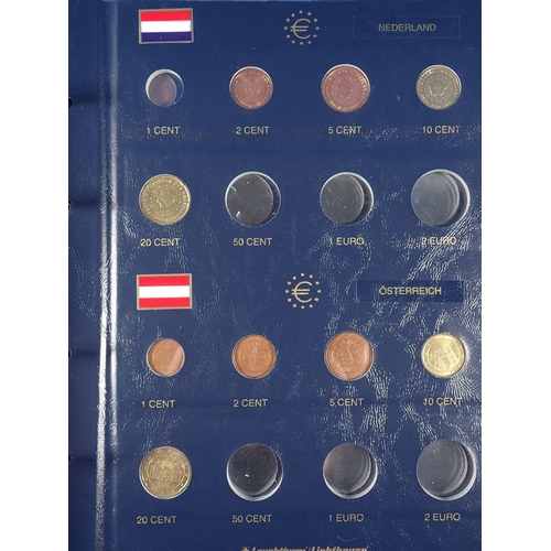 572 - A Euro collectors album with various coins plus a tub of Euro cents etc