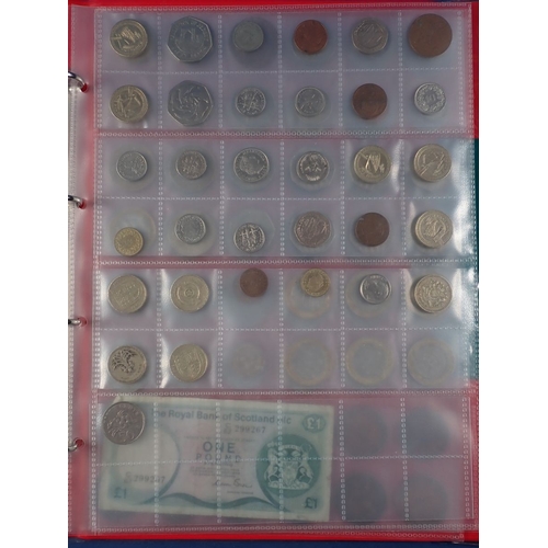 573 - A collectors album of mostly modern British coins including round pounds, two pounds, fifty pence co... 