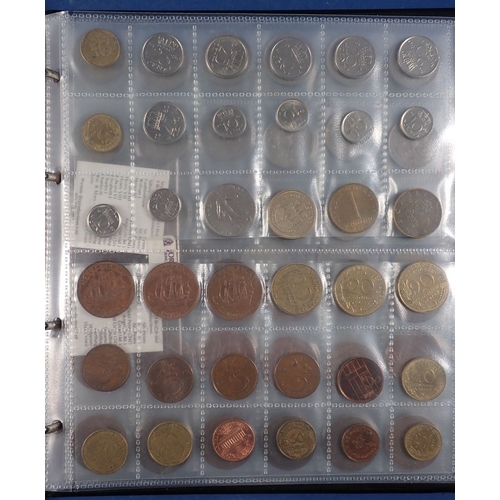 574 - An album of British and World coins including silver examples, pre 1920 shillings x3, threepences x9... 
