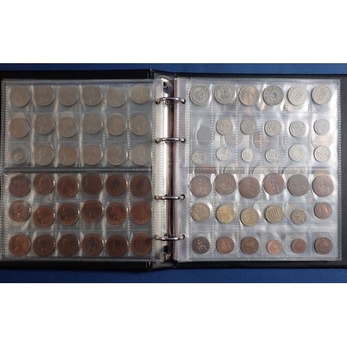 574 - An album of British and World coins including silver examples, pre 1920 shillings x3, threepences x9... 