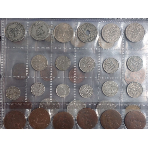 574 - An album of British and World coins including silver examples, pre 1920 shillings x3, threepences x9... 