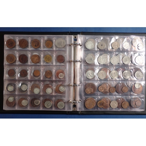 574 - An album of British and World coins including silver examples, pre 1920 shillings x3, threepences x9... 