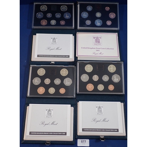 577 - Four Royal Mint United Kingdom proof coin collections in blue case, 1983 and 1989 x3