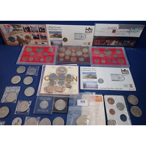 578 - A collection of British coins including commemorative crowns, two pound coins, cased sets etc
