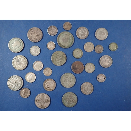 583 - A group of British silver coins including Victoria - George VI, threepences, sixpences, shillings, f... 