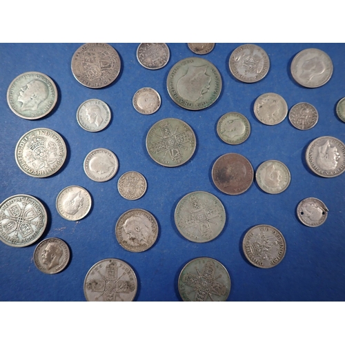 583 - A group of British silver coins including Victoria - George VI, threepences, sixpences, shillings, f... 