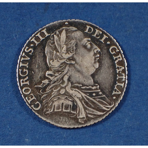 585 - A George III silver shilling 1787 Cond: VF