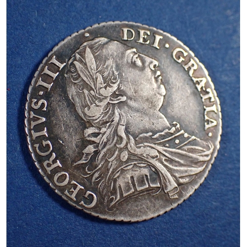 585 - A George III silver shilling 1787 Cond: VF