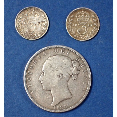 593 - A Victoria silver half crown 1880 young head plus two George V threepences 1917 and 1921, total weig... 