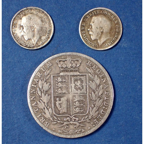 593 - A Victoria silver half crown 1880 young head plus two George V threepences 1917 and 1921, total weig... 
