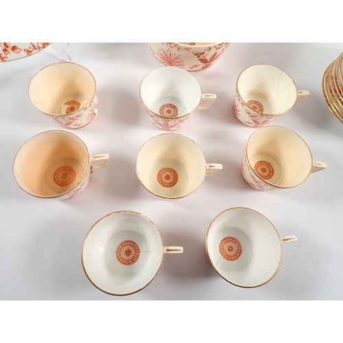 23 - A Victorian tea service with ironstone red anthemion and foliage decoration comprising eight cups an... 