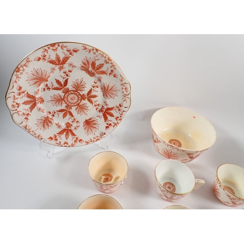 23 - A Victorian tea service with ironstone red anthemion and foliage decoration comprising eight cups an... 