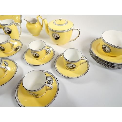 25 - A Foley yellow silhouette part tea set No 303 comprising teapot, five cups and saucers, six tea plat... 