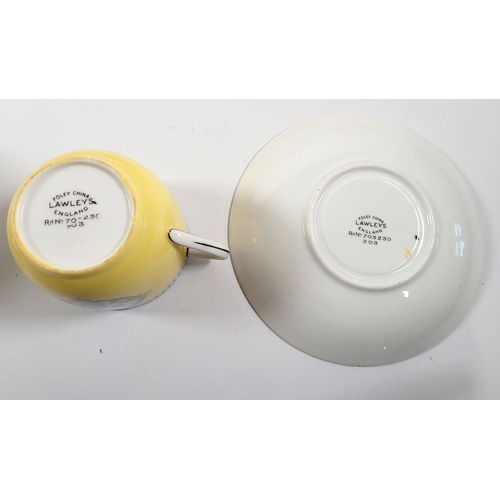 25 - A Foley yellow silhouette part tea set No 303 comprising teapot, five cups and saucers, six tea plat... 