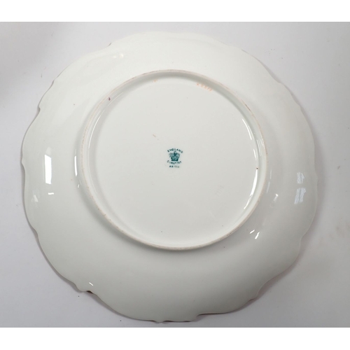 44 - An Edwardian Coalport dessert service with floral reserves on an apple green ground comprising three... 