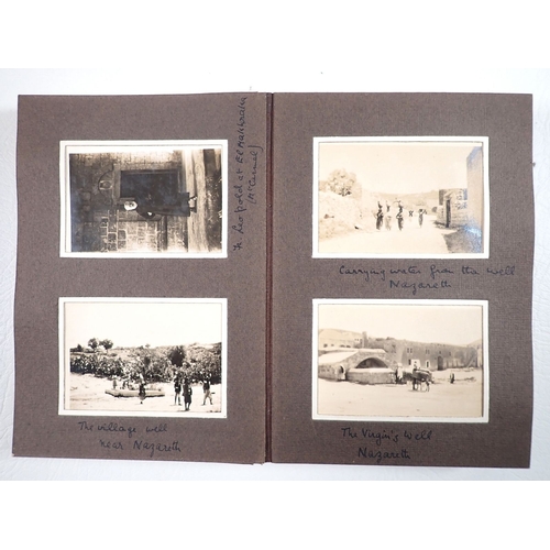 748 - A black and white photograph album with images of Cairo, Jerusalem, Nazareth etc. over 50 in total