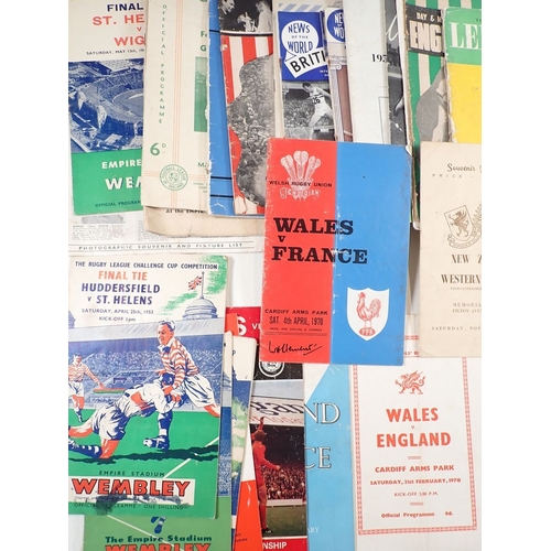 749 - A collection of sporting programmes and booklets including 1950's Rugby and Cricket programmes, Day ... 