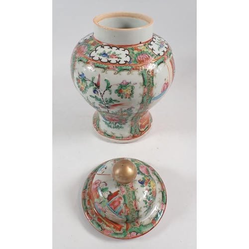 120 - A Chinese Famille rose jar and cover and a similar Chinese vase, 21cm