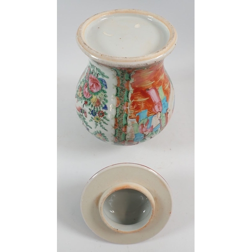 120 - A Chinese Famille rose jar and cover and a similar Chinese vase, 21cm