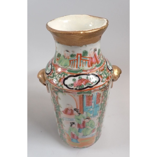 120 - A Chinese Famille rose jar and cover and a similar Chinese vase, 21cm