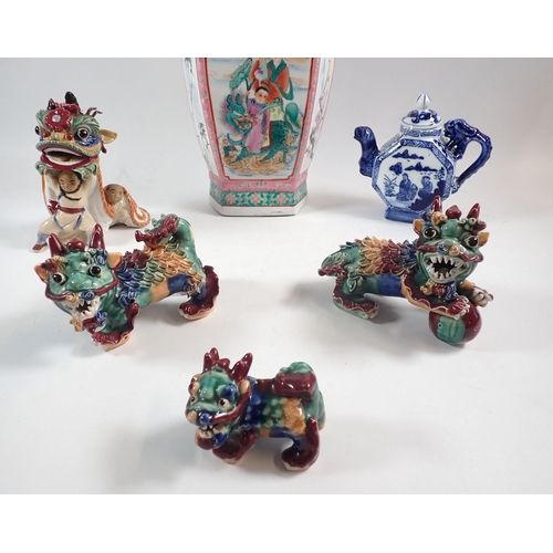 121 - A reproduction Chinese Famille rose style vase, 37cm, four Kylin lions and a blue and white teapot