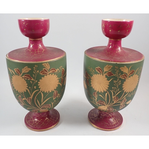 122 - Two ceramic vases with gilt flower decoration, 30.5cm tall