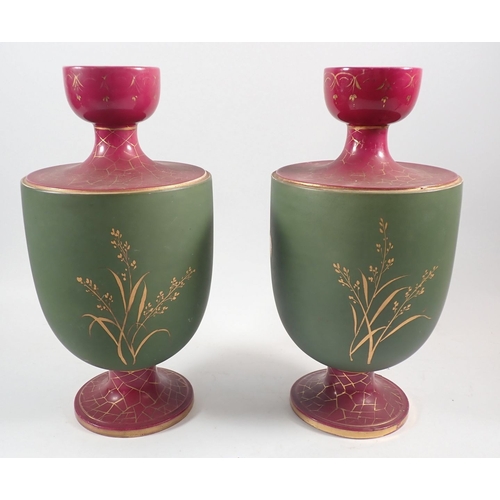 122 - Two ceramic vases with gilt flower decoration, 30.5cm tall