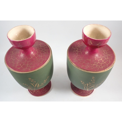 122 - Two ceramic vases with gilt flower decoration, 30.5cm tall