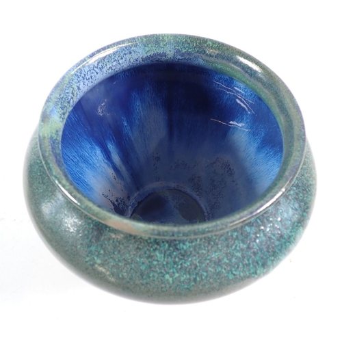 123 - A Cobridge green and blue speckled glaze vase, 13cm tall