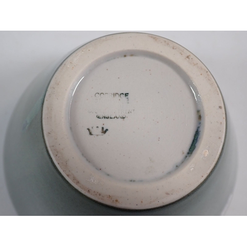 123 - A Cobridge green and blue speckled glaze vase, 13cm tall