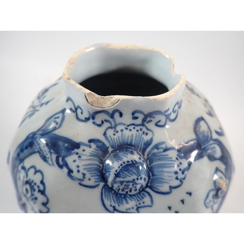 127 - A Delft vase and cover painted town scenes with bird finial, 25cm - some damage