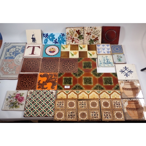 131 - A box of various decorative tiles