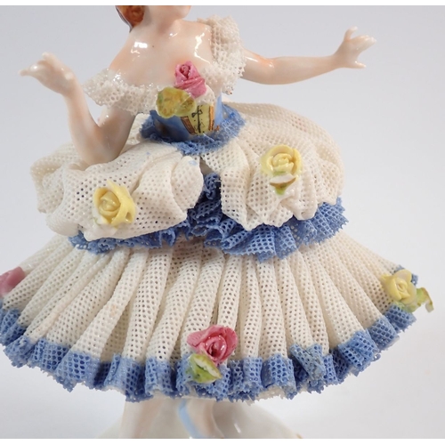 134 - A pair of Sitzendorf figures 'Bird Catcher' and 'Flower Seller' together with a Dresden lace dancing... 