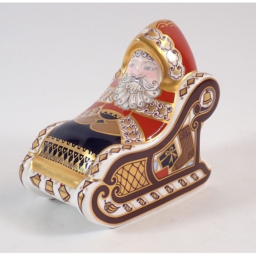 139 - A Royal Crown Derby Father Christmas on sleigh group, 9.5cm tall