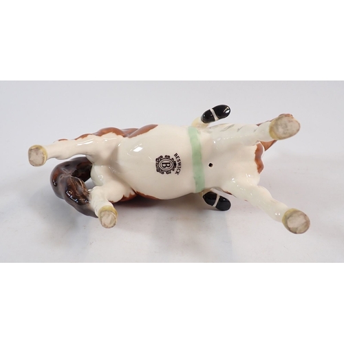 151 - A Beswick girl on Skewbald pony 14.5cm tall