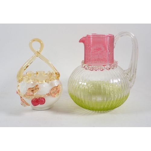 167 - A Victorian glass large jug with cranberry and vaseline glass trailed decoration to top and bottom, ... 