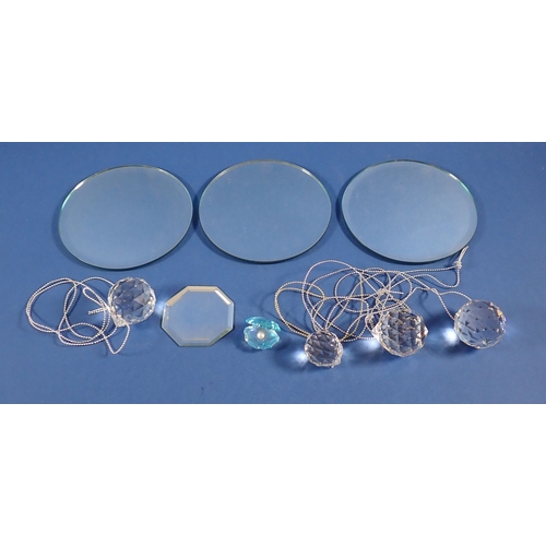 170 - A Swarovski oyster shell and four baubles plus three mirrored stands