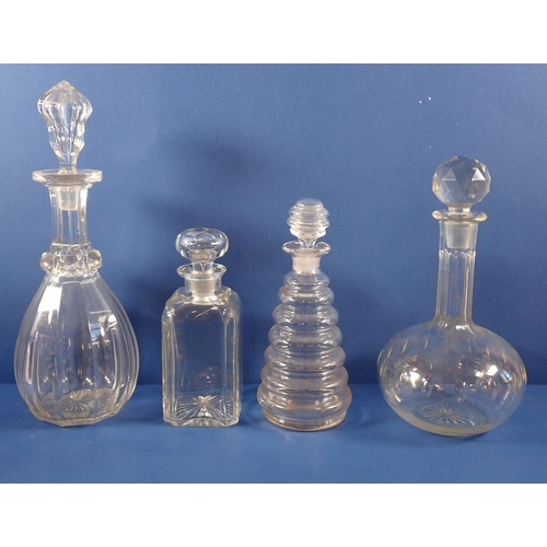 175 - A collection of decanters including antique cut glass examples, claret jug and a Bristol blue decant... 