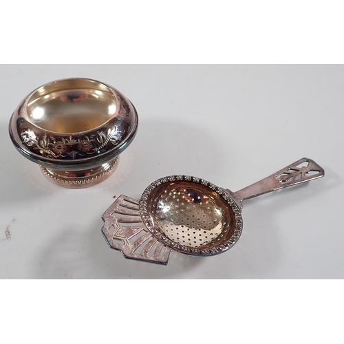 185 - An Art Nouveau silver plated four piece tea service with floral embossed decoration with tea straine... 